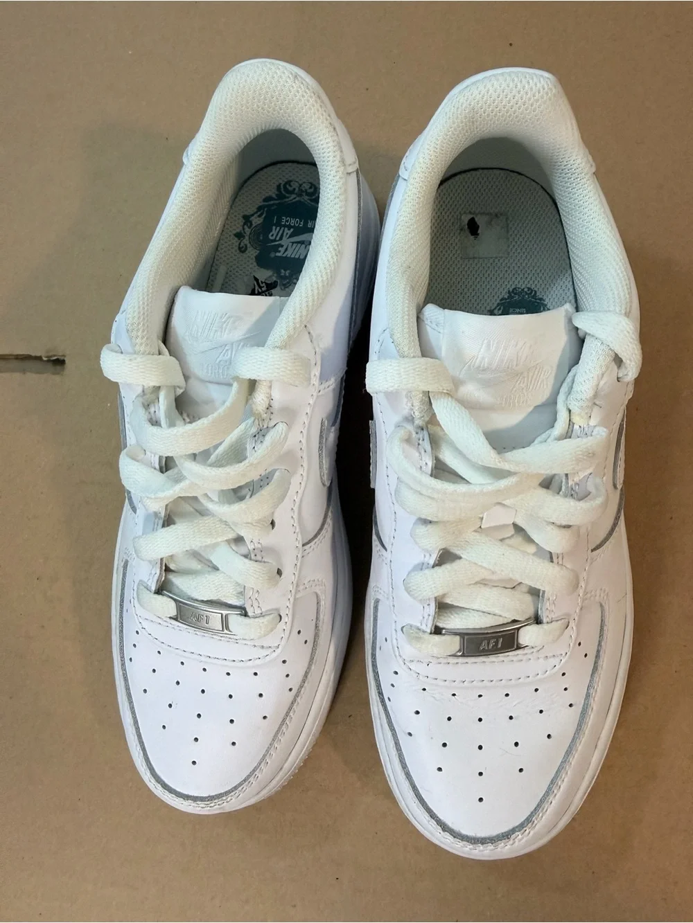 Nike Kids White Low-Top Leather Sneakers with Lace-Up Closure